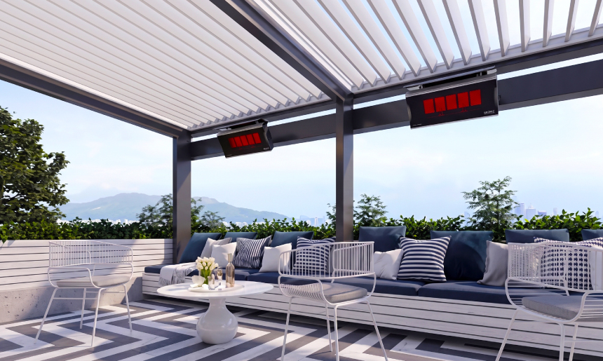 Bromic Platinum Series electric patio heaters mounted above a covered outdoor lounge